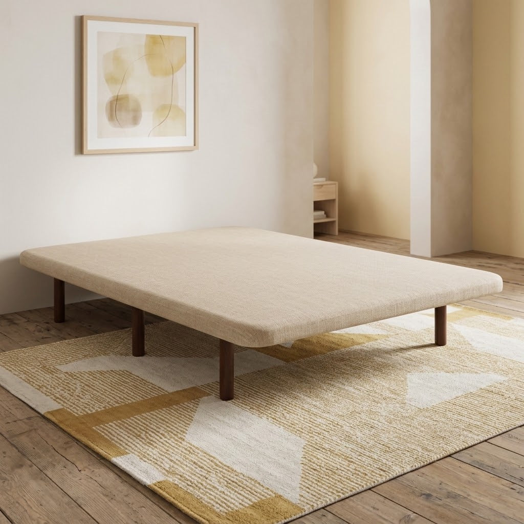 Base tapizada Ares con estructura de tubo de acero y tejido 3D beige transpirable. Soporte firme, seguro y antideslizante para tu colchón.